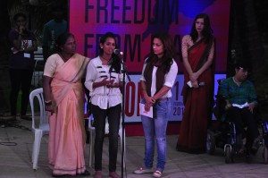 This 14-year old girl (second from left) is the daughter of a sex worker (the mother is not in the photo). She rose against violence on Feb 14, to speak about the rights of sex workers to a life free from fear and abuse.